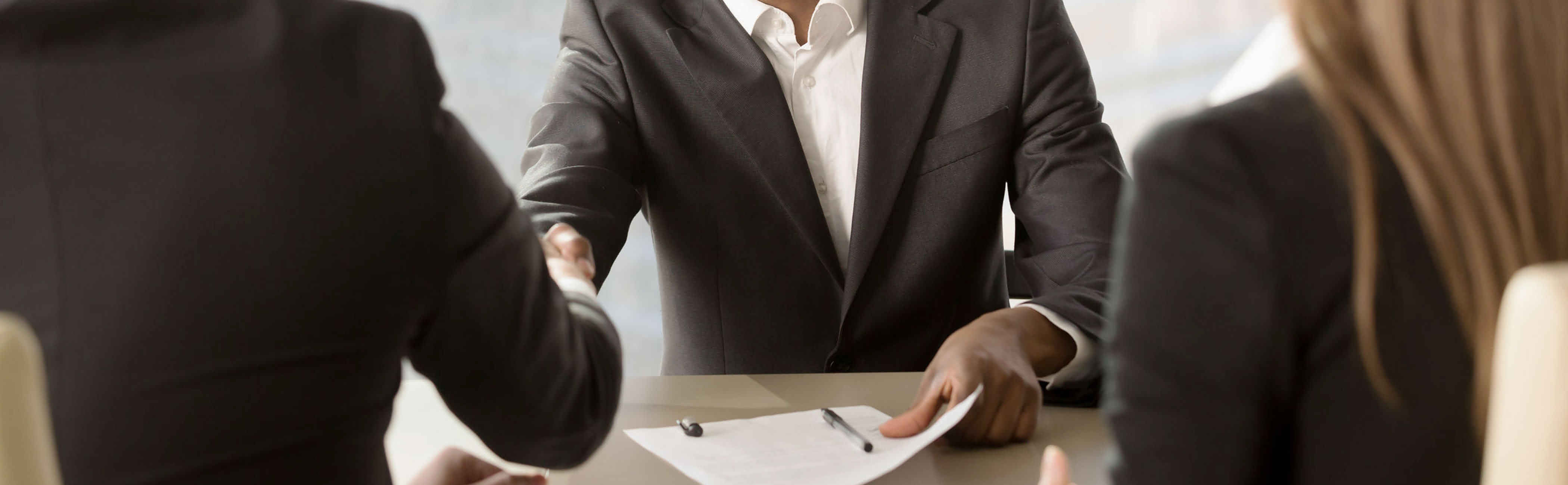 Businessman happy to have closed a deal due to a fabulous USP.